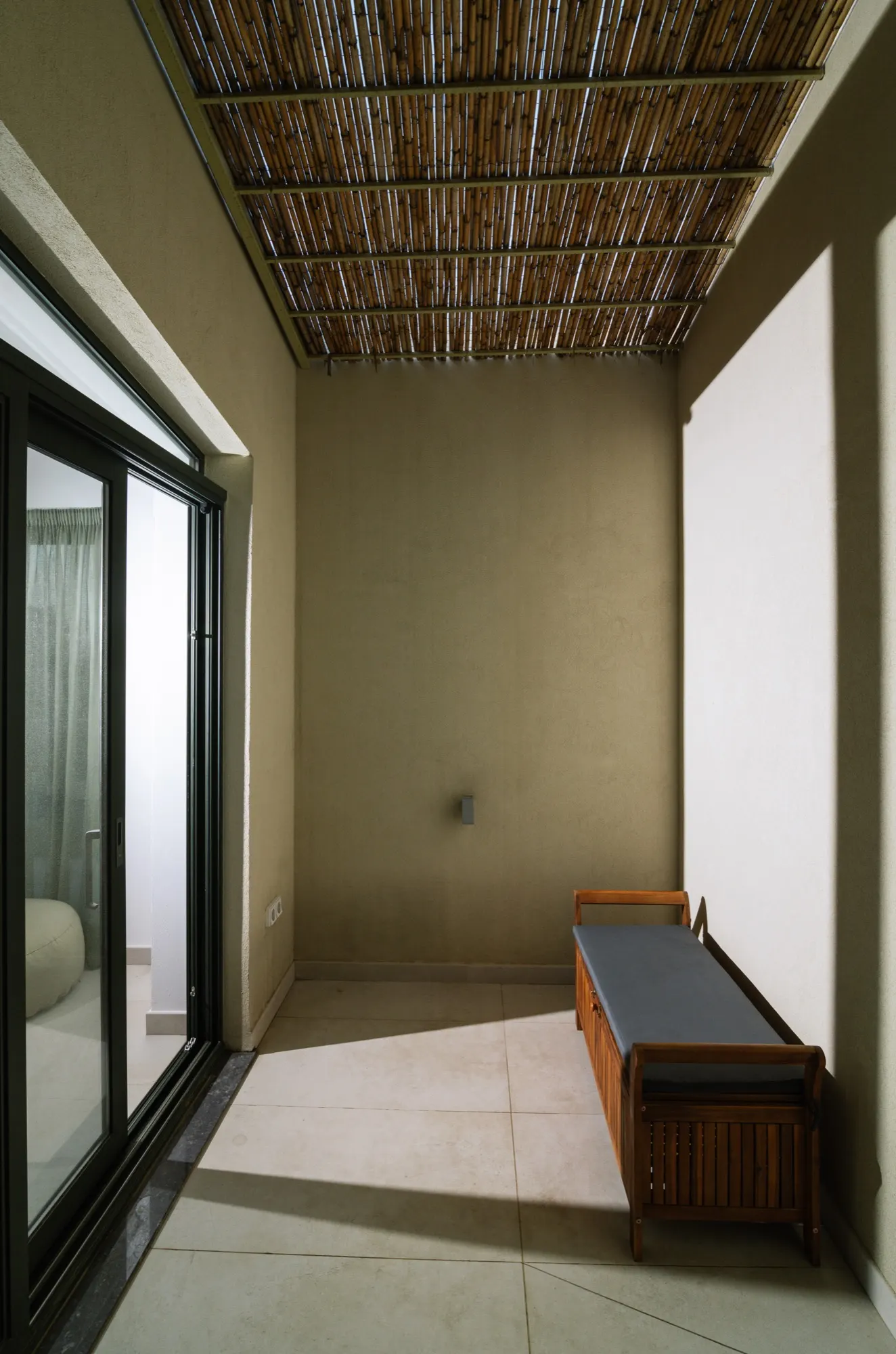 Lower Guesthouse private patio between concrete wings